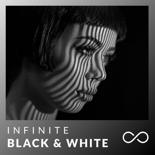 A Striking Black And White Image Of A Woman'S Face With Short Hair Illuminated By Striped Shadows. The Shadows Create A Pattern Over Her Face. The Text &Quot;Infinite Black &Amp; White V1.0.1 Cracked&Quot; Appears At The Bottom Along With An Infinity Symbol.